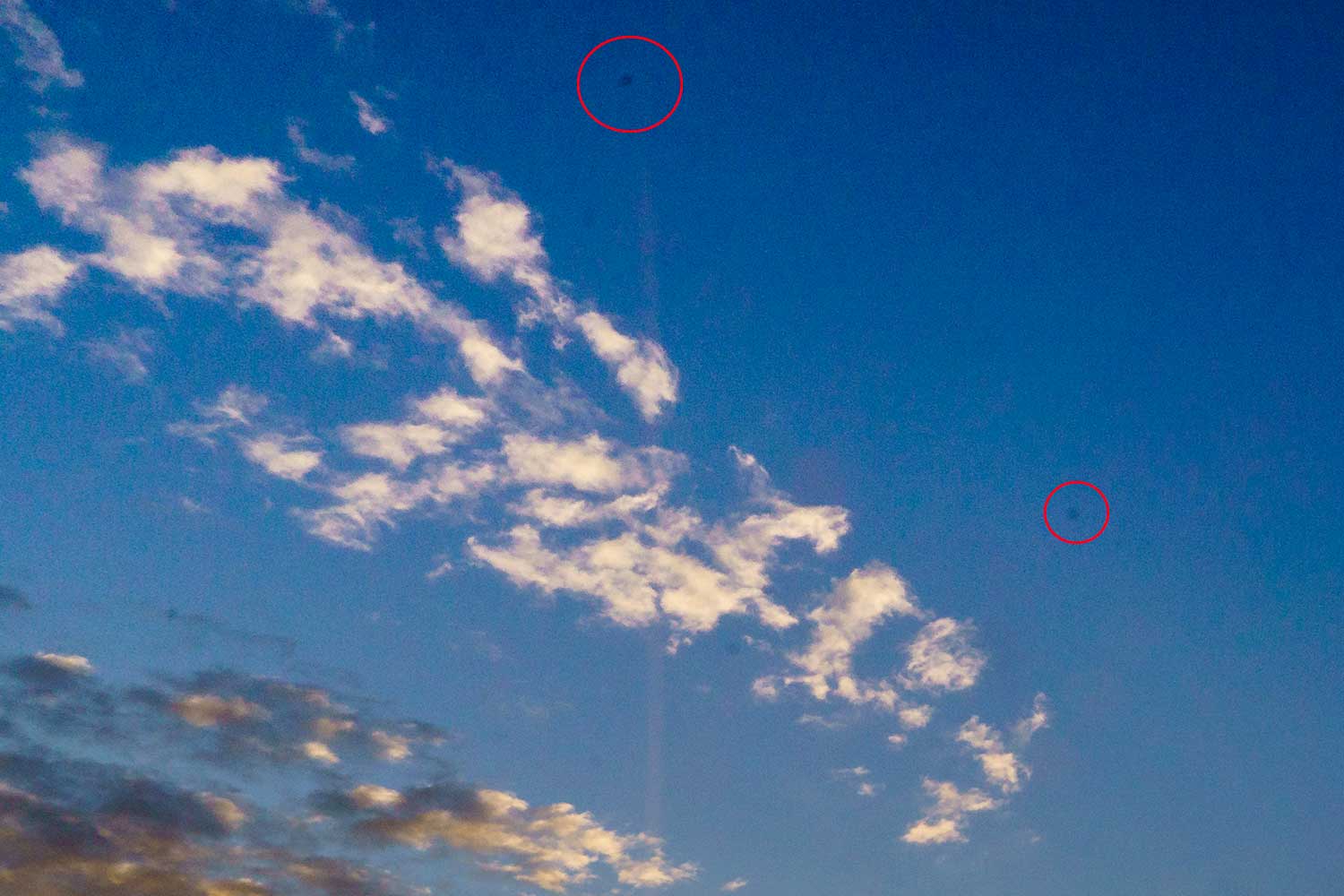 Photograph of sky showing dust on camera sensor
