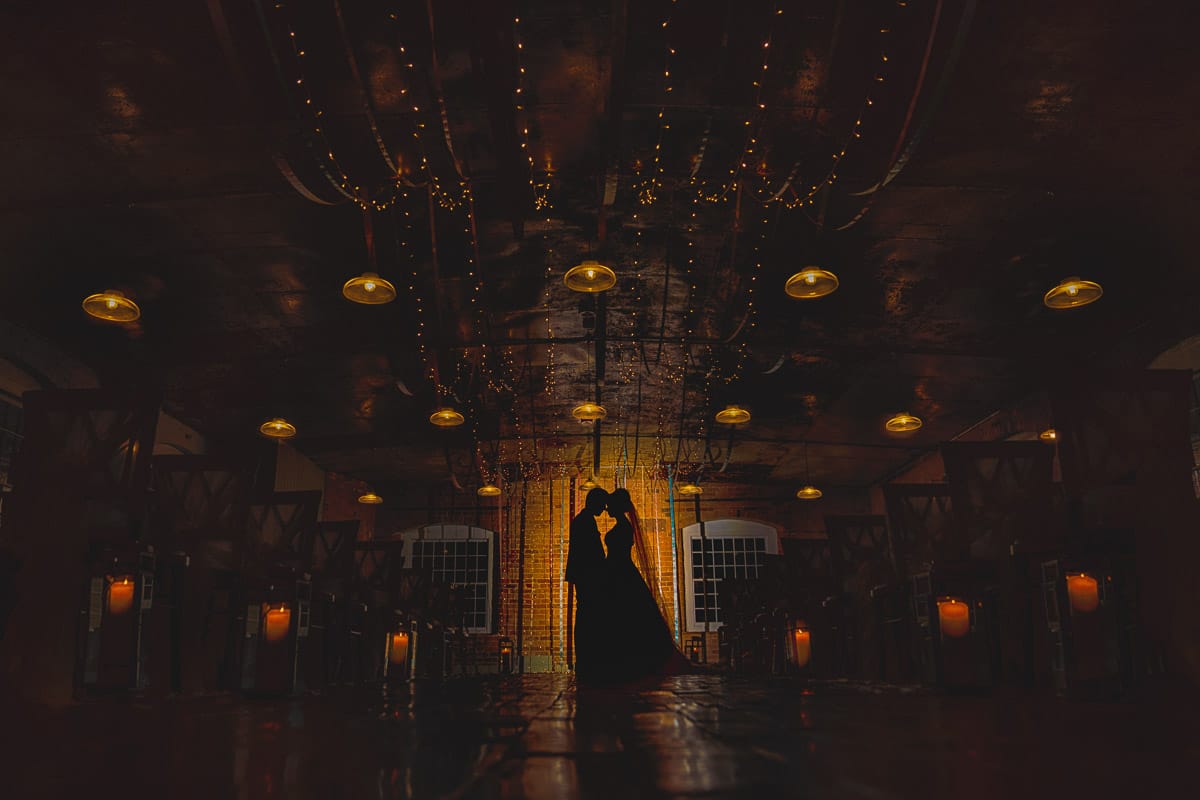 Night time Bride & groom portrait at West Mill in ceremony room