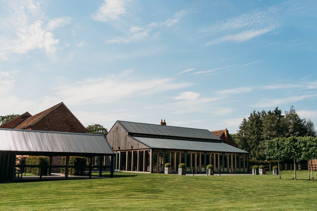 Rear of Hazel Gap Barn with the gardens in the foreground